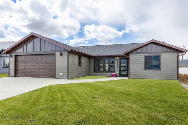 2305 S Colorado, Butte, MT 59701 - view of front facade featuring board and batten siding, an attached garage, driveway, a front yard, and roof with shingles