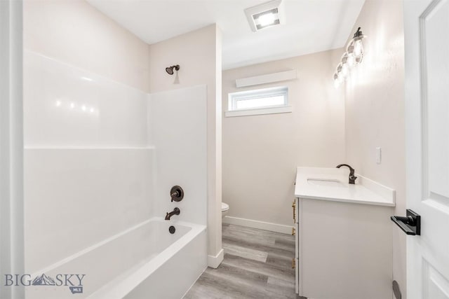 2305 S Colorado, Butte, MT 59701 - bathroom featuring vanity,  shower combination, and wood finished floors