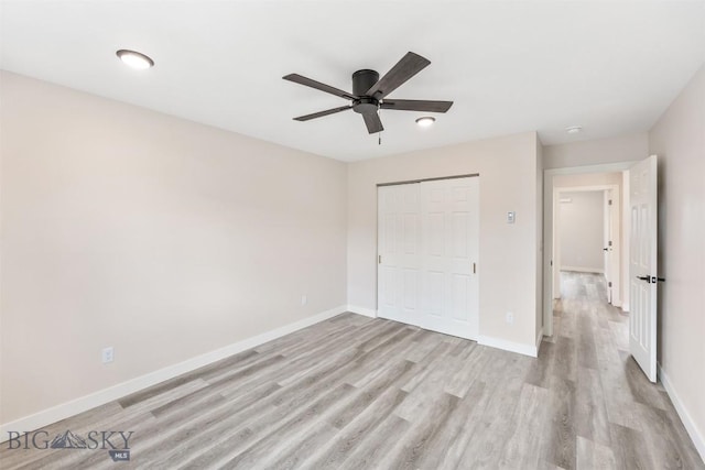 2305 S Colorado, Butte, MT 59701 - unfurnished bedroom featuring light wood-type flooring, a closet, and ceiling fan