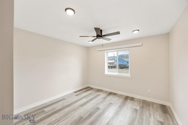 2305 S Colorado, Butte, MT 59701 - spare room featuring a ceiling fan and light wood-style flooring