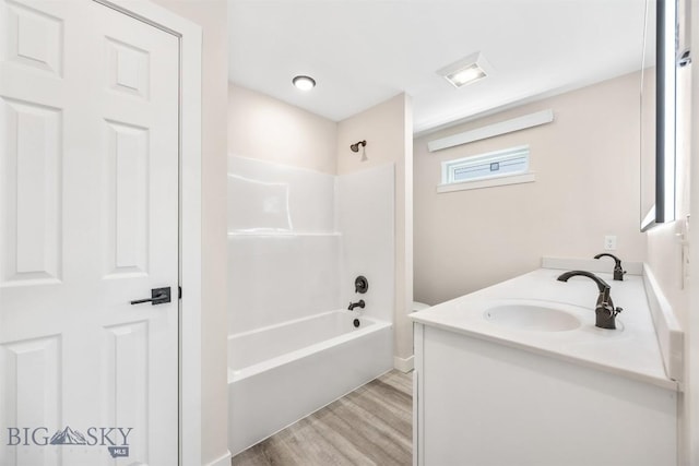 2305 S Colorado, Butte, MT 59701 - full bath with wood finished floors, vanity, and  shower combination