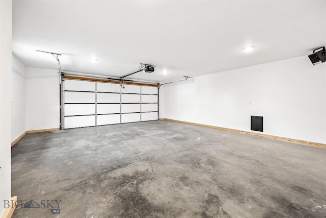 2305 S Colorado, Butte, MT 59701 - garage featuring a garage door opener