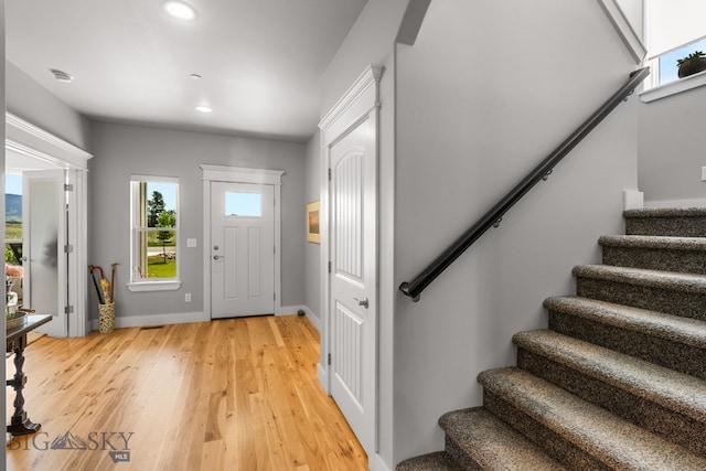 85 Riparian Way, Bozeman, MT 59718 - foyer with stairway, light wood-style floors, and recessed lighting