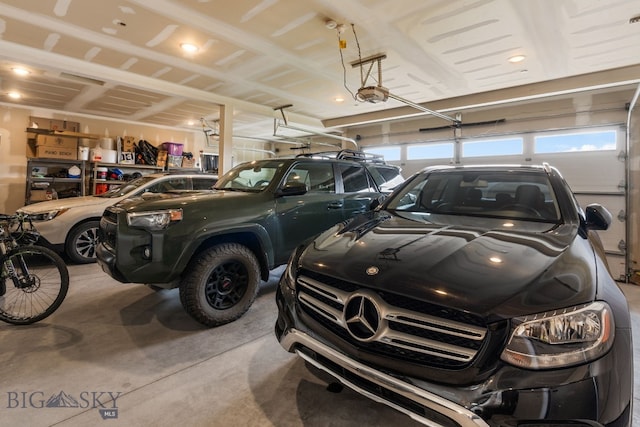 85 Riparian Way, Bozeman, MT 59718 - garage featuring a garage door opener