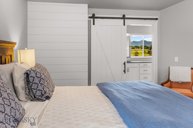 85 Riparian Way, Bozeman, MT 59718 - bedroom with a barn door