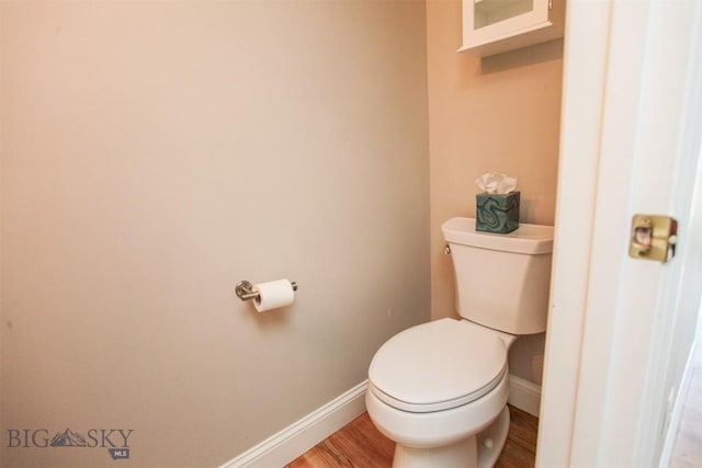 717 N Aster Ave, Bozeman, MT 59718 - bathroom featuring baseboards and wood finished floors