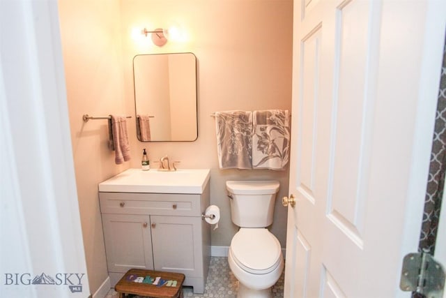 717 N Aster Ave, Bozeman, MT 59718 - bathroom featuring toilet and vanity