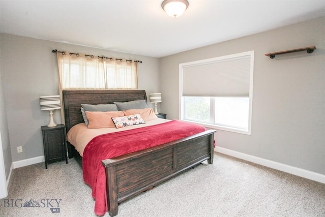 717 N Aster Ave, Bozeman, MT 59718 - carpeted bedroom featuring multiple windows