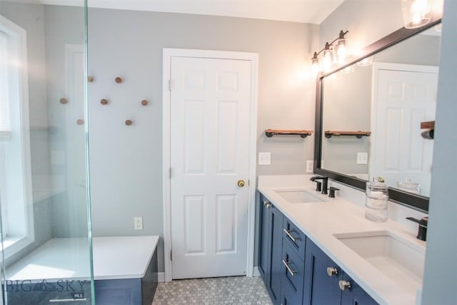 717 N Aster Ave, Bozeman, MT 59718 - bathroom with double vanity and tile patterned floors