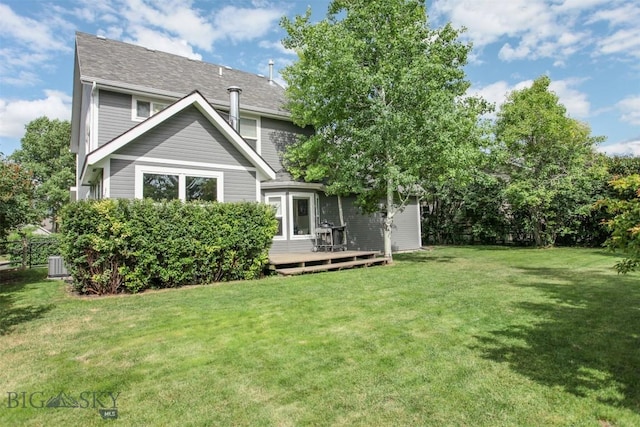 717 N Aster Ave, Bozeman, MT 59718 - back of house featuring a deck, a yard, and a shingled roof