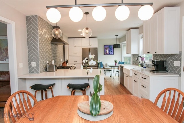 717 N Aster Ave, Bozeman, MT 59718 - dining space featuring light wood finished floors