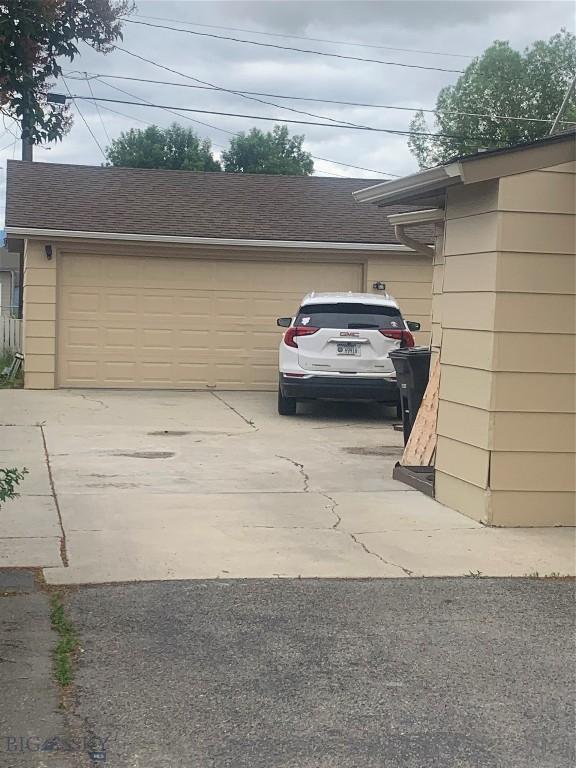 2320 S S Dr, Butte, MT 59701 - garage featuring concrete driveway
