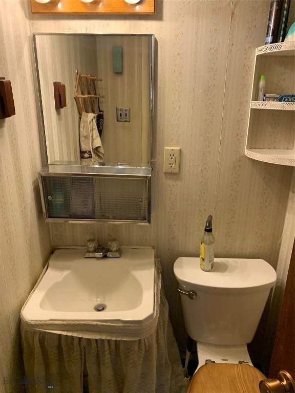 2320 S S Dr, Butte, MT 59701 - half bathroom with toilet and vanity