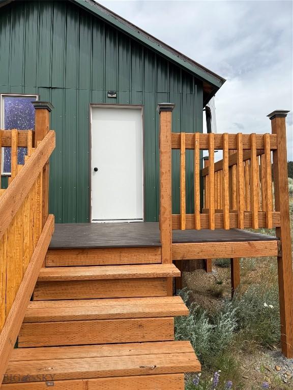 357 Pole Gulch Rd, Three Forks, MT 59752 - property entrance with board and batten siding