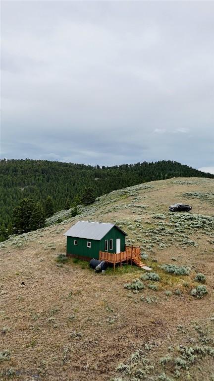 357 Pole Gulch Rd, Three Forks, MT 59752 - aerial view of sparsely populated area with a forest
