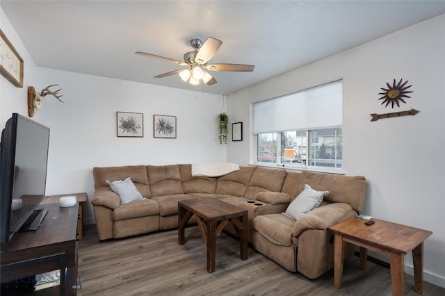 208 Show Pl Unit A, Belgrade, MT 59714 - living room with a ceiling fan and wood finished floors