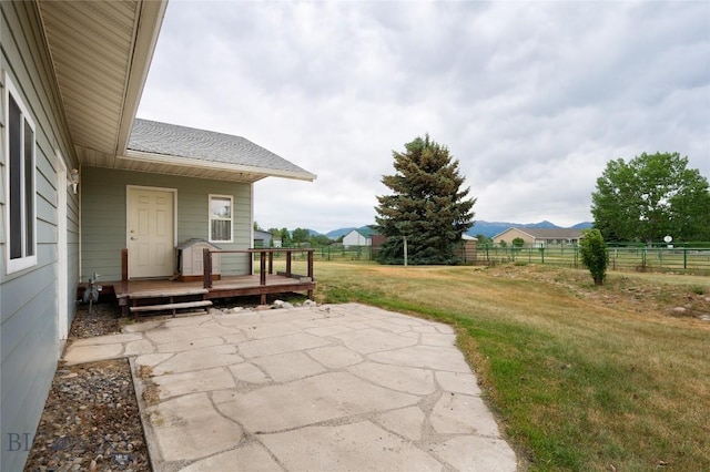 1680 Remuda Dr, Belgrade, MT 59714 - view of patio with a wooden deck