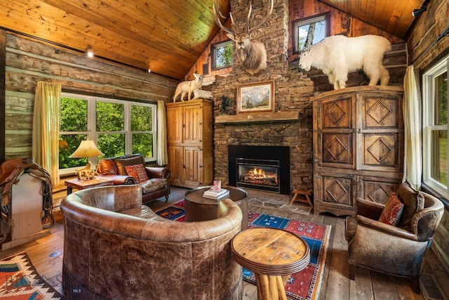 207 Martinez Spring Rd, Bozeman, MT 59718 - living room featuring hardwood / wood-style flooring, wooden ceiling, plenty of natural light, high vaulted ceiling, and a fireplace