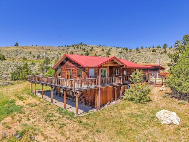 2 Eight Mile Creek Rd, Ennis, MT 59729 - back of house featuring a deck and a metal roof