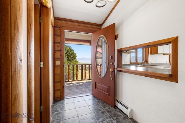 2 Eight Mile Creek Rd, Ennis, MT 59729 - doorway featuring a baseboard radiator and lofted ceiling