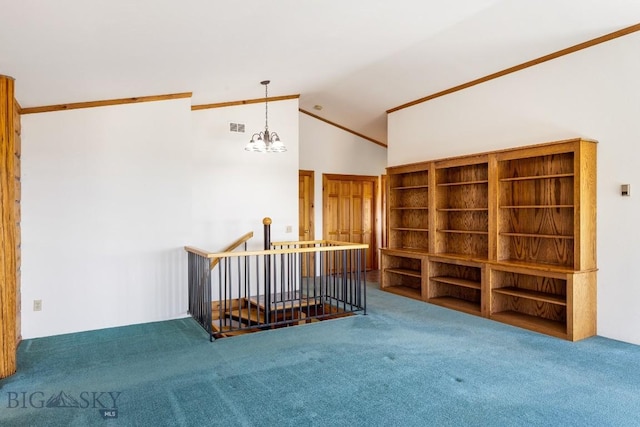 2 Eight Mile Creek Rd, Ennis, MT 59729 - carpeted empty room with vaulted ceiling and a chandelier