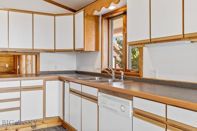 2 Eight Mile Creek Rd, Ennis, MT 59729 - kitchen with dishwasher, white cabinetry, vaulted ceiling, and dark countertops