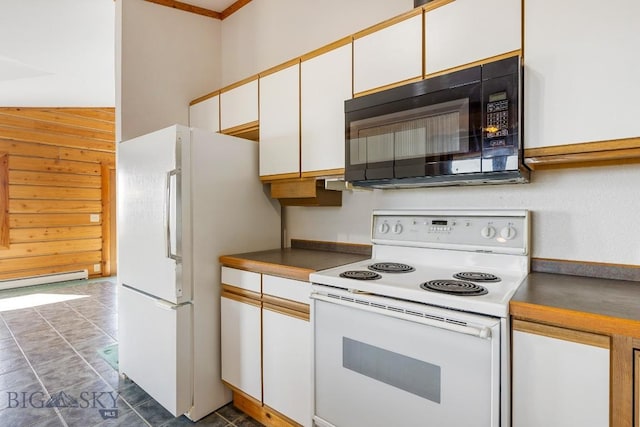 2 Eight Mile Creek Rd, Ennis, MT 59729 - kitchen featuring white appliances, white cabinets, a baseboard radiator, dark countertops, and wood walls