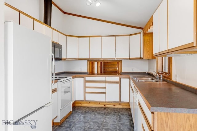2 Eight Mile Creek Rd, Ennis, MT 59729 - kitchen featuring white appliances, lofted ceiling, dark countertops, and white cabinets