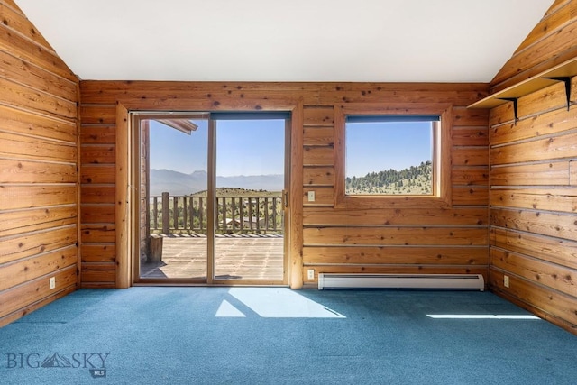 2 Eight Mile Creek Rd, Ennis, MT 59729 - spare room featuring vaulted ceiling, a baseboard radiator, carpet floors, a mountain view, and wood walls