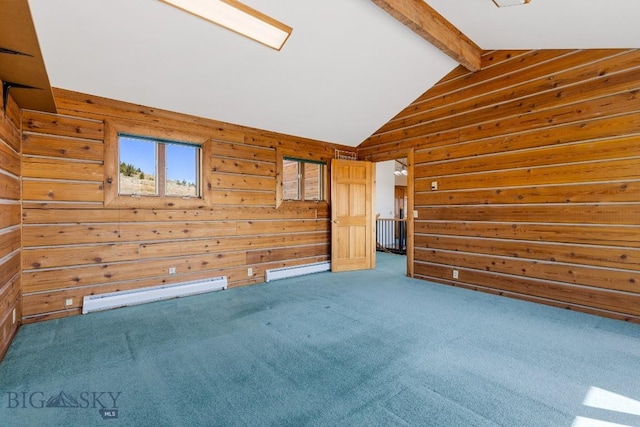 2 Eight Mile Creek Rd, Ennis, MT 59729 - unfurnished room with baseboard heating, wooden walls, and carpet