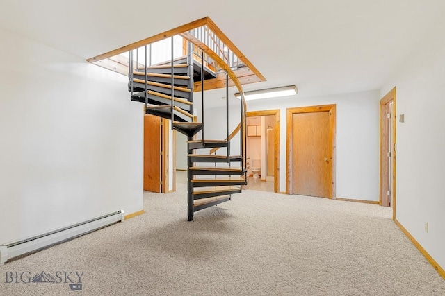 2 Eight Mile Creek Rd, Ennis, MT 59729 - stairway featuring baseboard heating and carpet