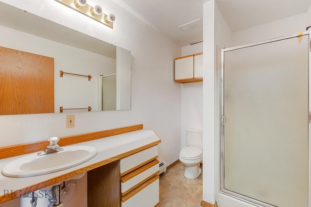2 Eight Mile Creek Rd, Ennis, MT 59729 - bathroom featuring a stall shower, vanity, and a baseboard heating unit
