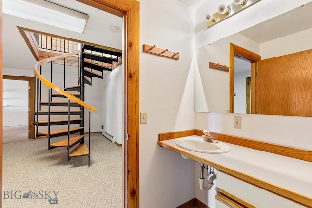 2 Eight Mile Creek Rd, Ennis, MT 59729 - bathroom featuring a sink and baseboard heating