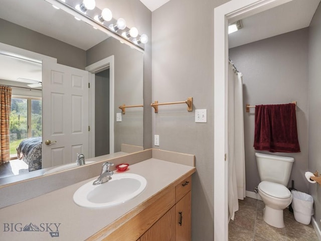 417 Firelight, Big Sky, MT 59716 - bathroom featuring vanity, tile patterned flooring, and ensuite bathroom