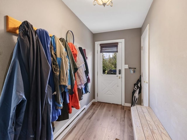 417 Firelight, Big Sky, MT 59716 - doorway to outside with wood finished floors and baseboards