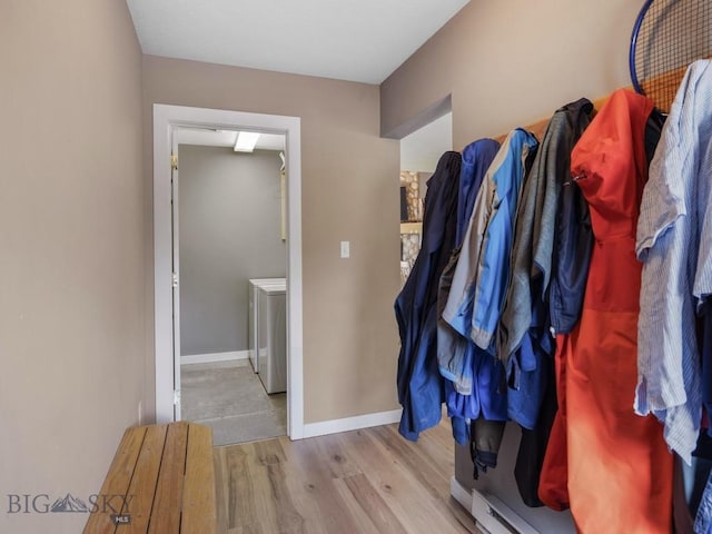 417 Firelight, Big Sky, MT 59716 - hall featuring washer / clothes dryer and wood finished floors