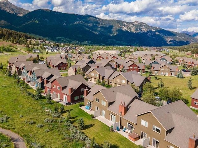 417 Firelight, Big Sky, MT 59716 - aerial perspective of suburban area with a mountainous background