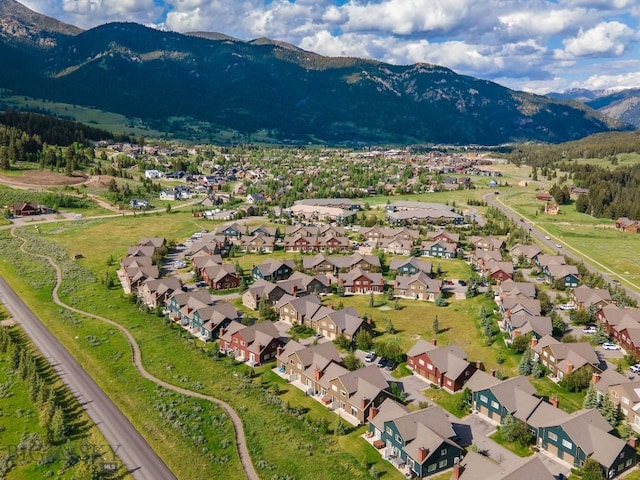417 Firelight, Big Sky, MT 59716 - aerial view of property and surrounding area featuring a mountainous background