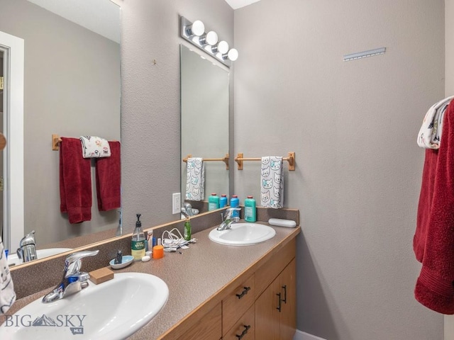 417 Firelight, Big Sky, MT 59716 - bathroom featuring double vanity