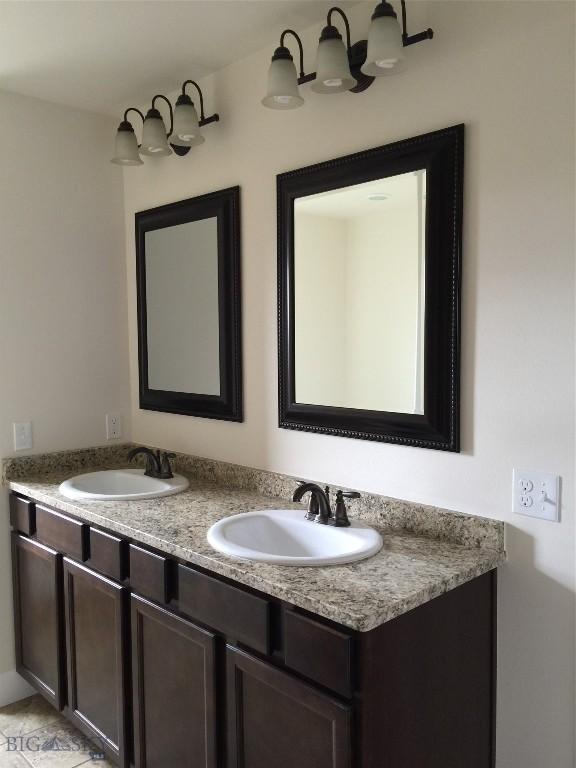 639 Avon Cir, Butte, MT 59701 - full bathroom featuring double vanity