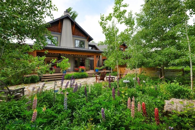 89 W Fieldview St, Bozeman, MT 59715 - back of property with a patio area and a chimney