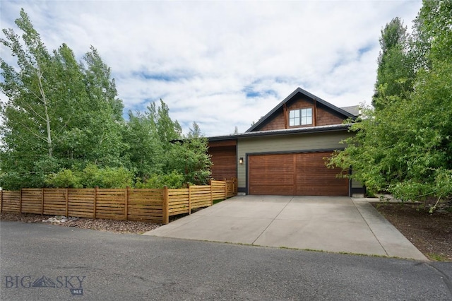 89 W Fieldview St, Bozeman, MT 59715 - view of front of property featuring concrete driveway and a garage