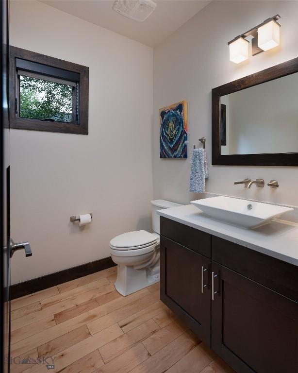 89 W Fieldview St, Bozeman, MT 59715 - bathroom featuring vanity and wood finished floors
