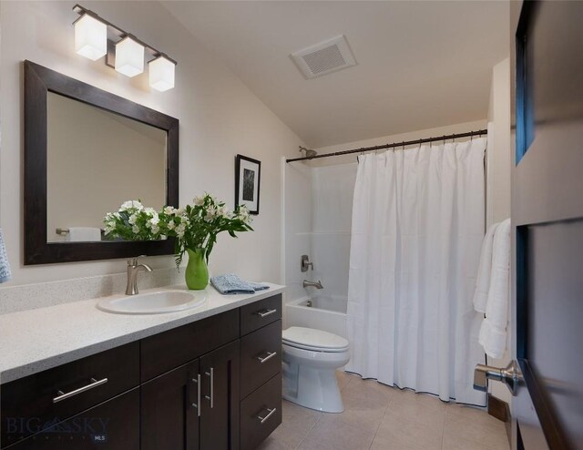 89 W Fieldview St, Bozeman, MT 59715 - full bath with vanity, lofted ceiling, tile patterned floors, and shower / tub combo with curtain