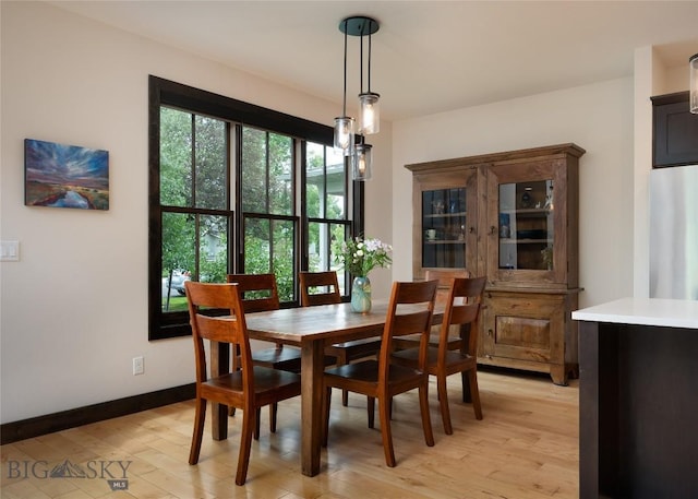 89 W Fieldview St, Bozeman, MT 59715 - dining space featuring light wood-type flooring and baseboards