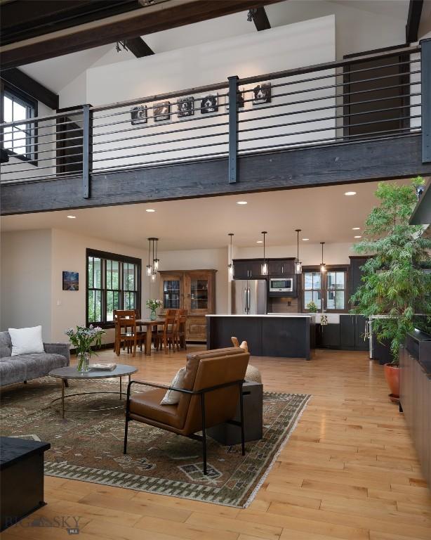 89 W Fieldview St, Bozeman, MT 59715 - living room featuring a high ceiling and light wood-style floors