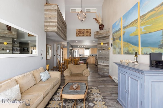 15 Spotted Fawn Ct, Big Sky, MT 59716 - living room featuring a towering ceiling and dark wood-style floors