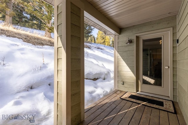 15 Spotted Fawn Ct, Big Sky, MT 59716 - view of snow covered deck
