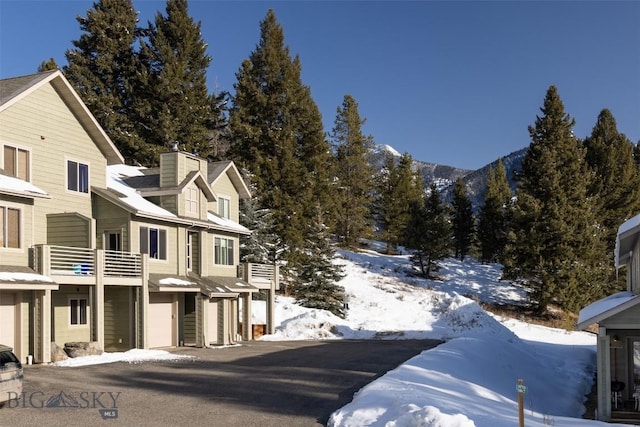 15 Spotted Fawn Ct, Big Sky, MT 59716 - view of asphalt driveway with a mountain view