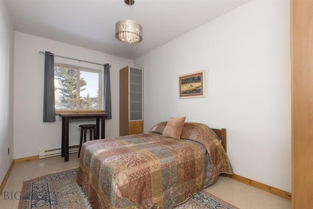 15 Spotted Fawn Ct, Big Sky, MT 59716 - bedroom featuring baseboards and a baseboard radiator
